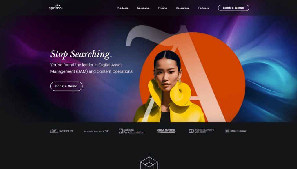 Aprimo homepage featuring digital asset management and content operations, with a bold headline, demo button, and logos of brands like Bank of America and Grainger.