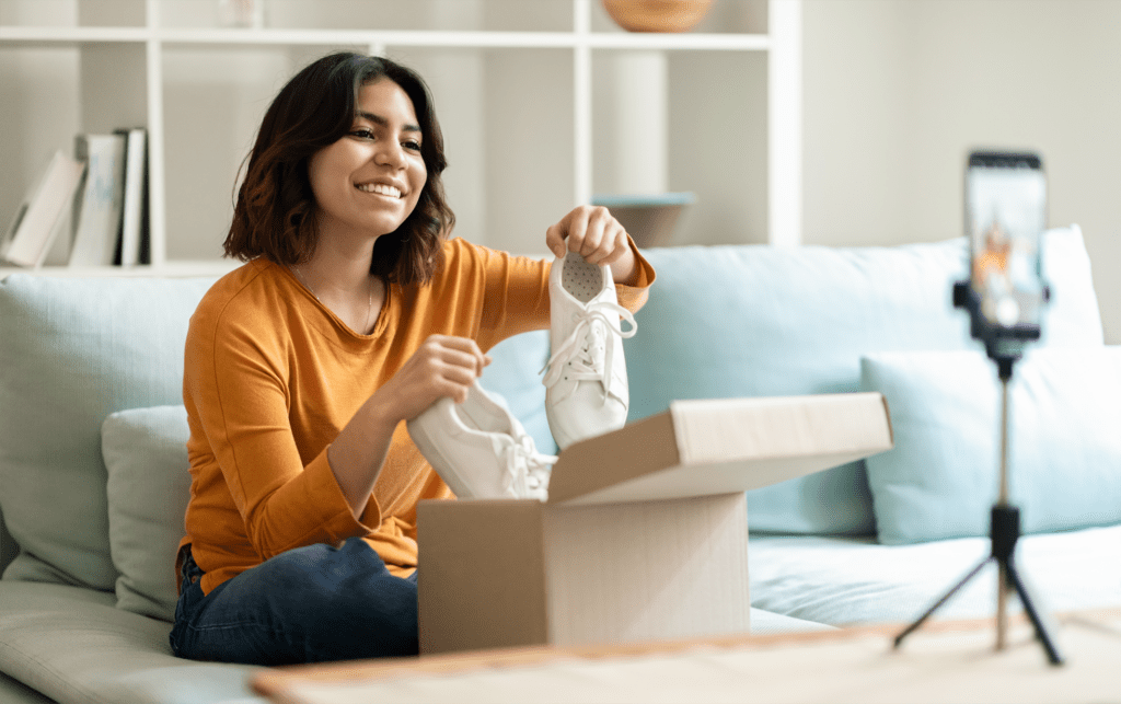 A woman creates review videos for shoes.